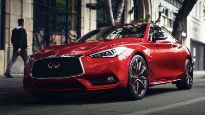 Exterior Driver Side View Of 2020 INFINITI Q60 RED SPORT 400 Coupe Shown In Dynamic Sunstone Red